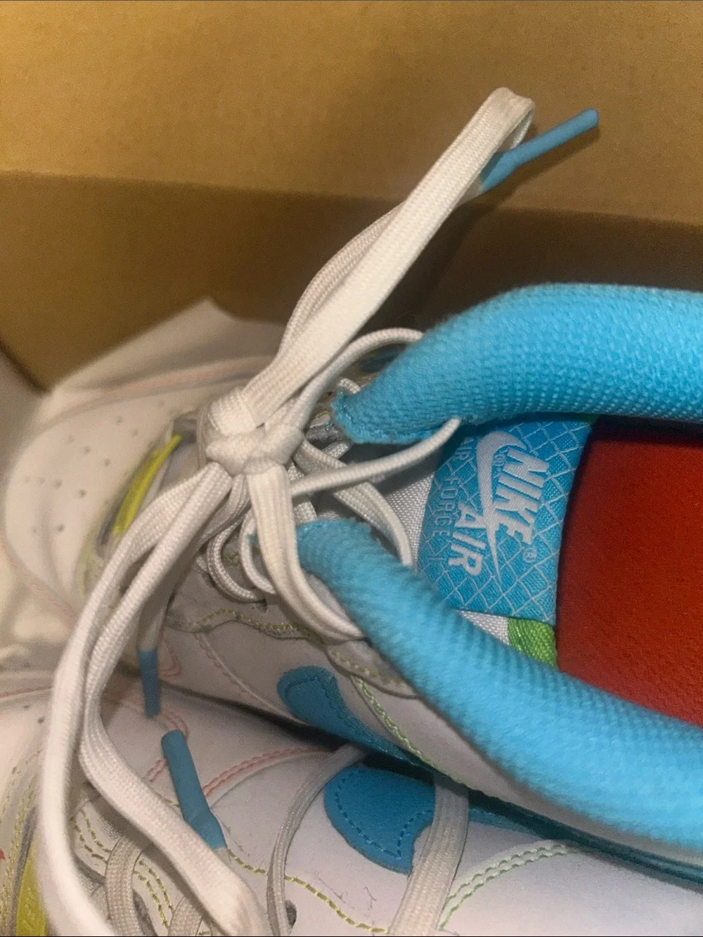 Nike Kids White Sneakers with Blue & Lime Accents